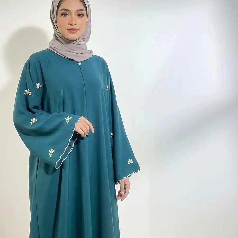 Teal abaya from the Inayah collection
